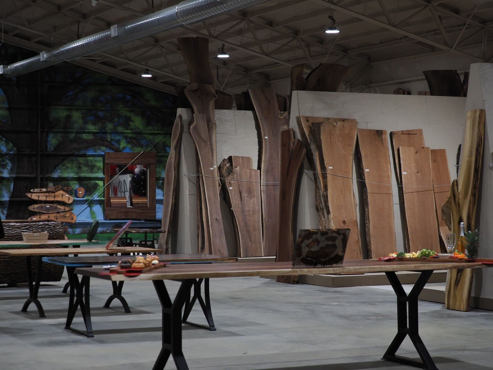 Wide shot of the APOC workshop and showroom floor with slabs