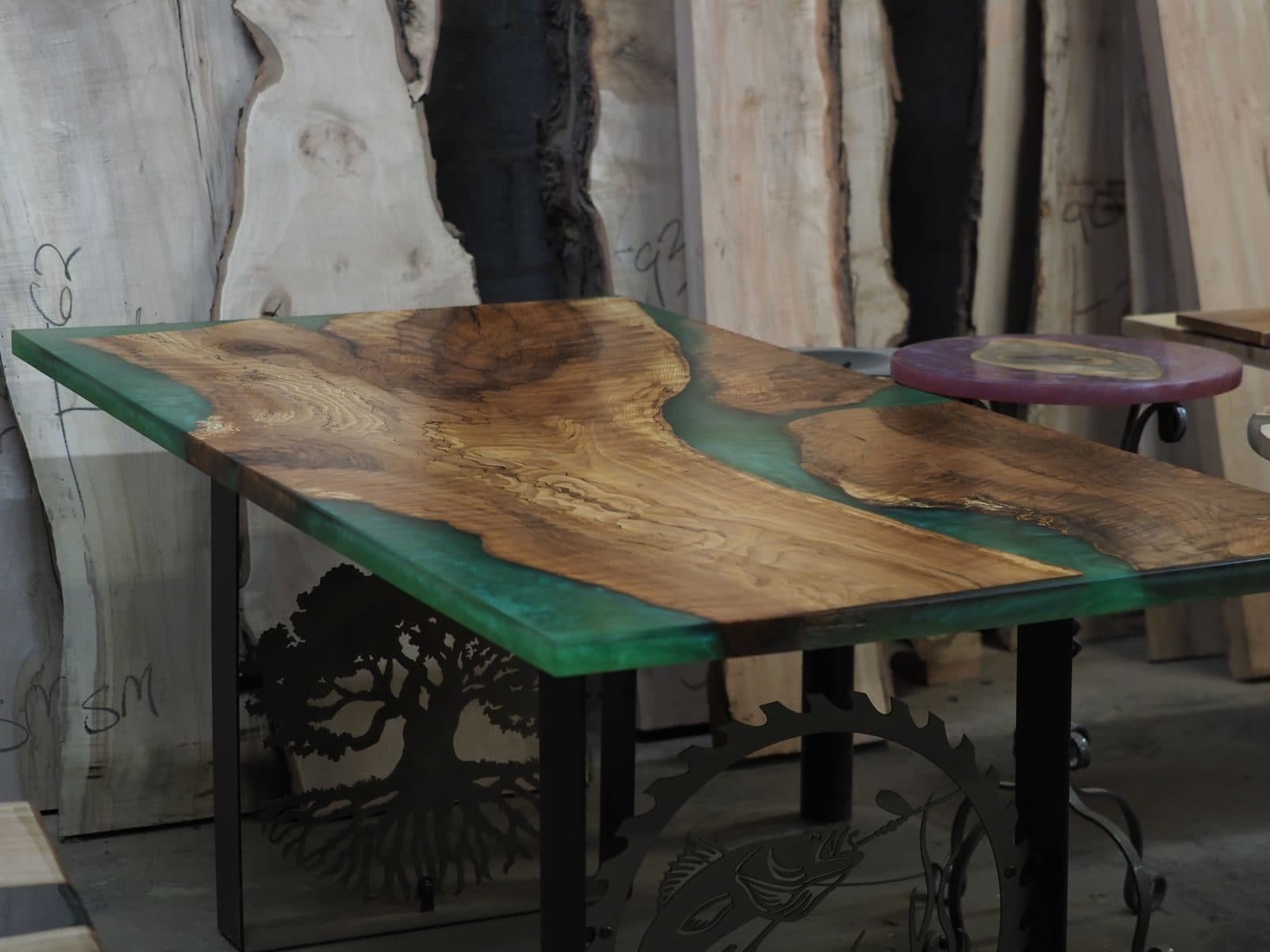 Commissioned live-edge conference table by APOC Cleveland — commercial hardwood slab installation